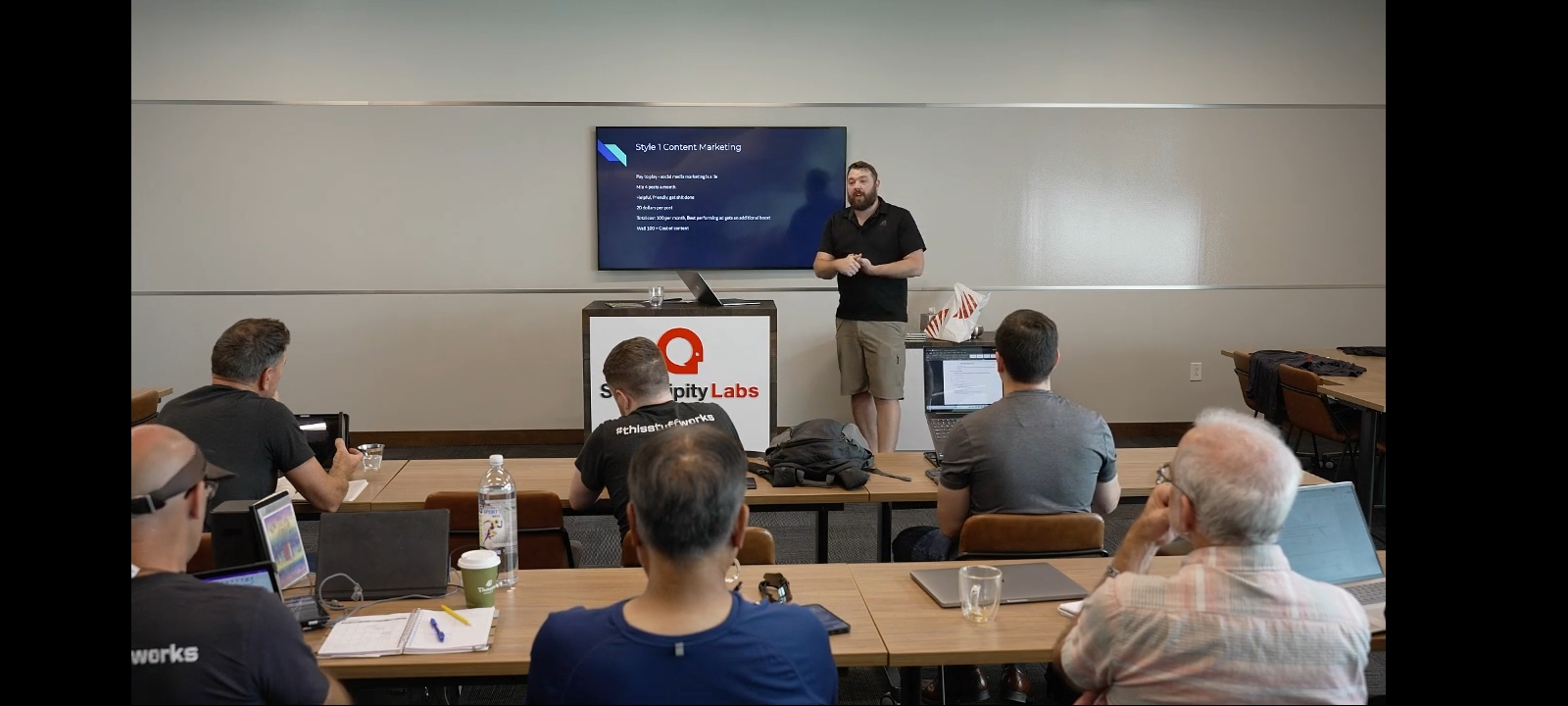 Sean teaching local business marketing at a conference